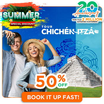 couple visitns chichen itza in mayan equinox season