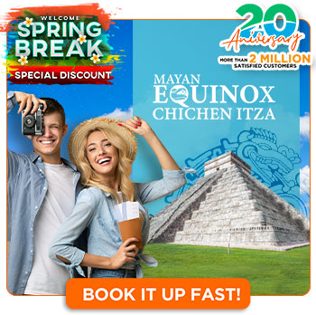 couple visitns chichen itza in mayan equinox season