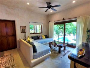 sala en habitación de Tulum